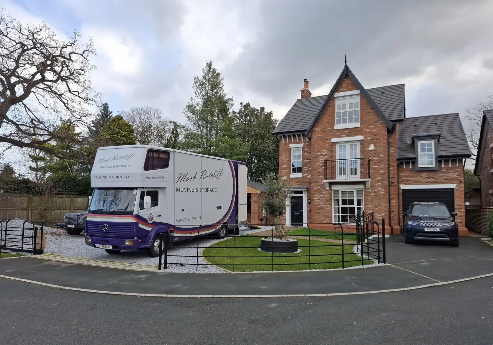 Mark Ratcliffe removal truck on a detached house driveway